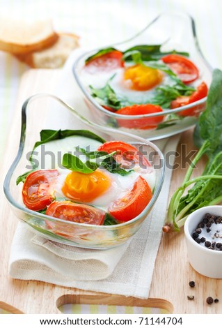 Baked egg with tomatoes,spinach and toast