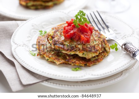 Zucchini pancakes with tomato salsa