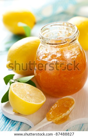 Jar of Lemon Marmalade with Fresh Lemons