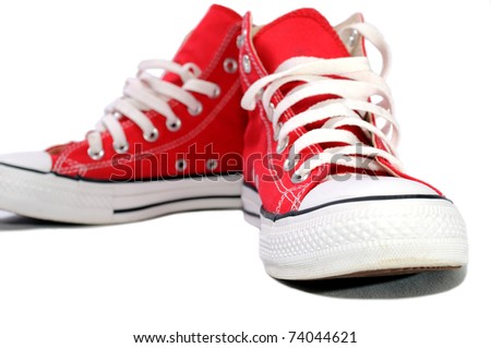 Red sneakers on white background