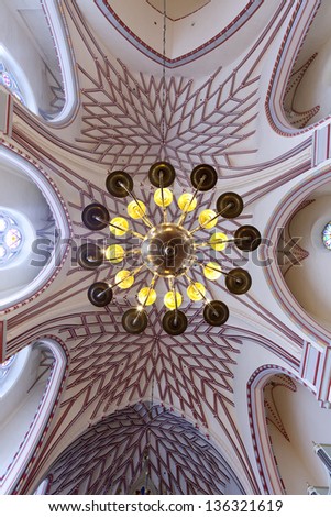 church ceiling with chandelier