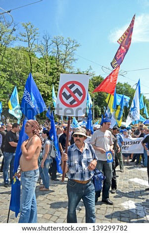 KIEV - MAY 18: Political meeting against fascism on May 18, 2013 in Kiev, Ukraine. About 50000 people take part in meeting in Kiev organized by Party of Regions.