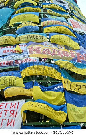 KIEV - DEC 06: Wall from flags on Euro maidan meeting in Kiev on December 06, 2013. Meeting devoted to declining of Ukraine for integration to the European Union.
