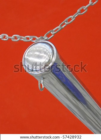 silver metallic chain line on red surface. strong industrial connection concept