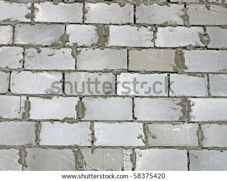 white brick textured wall. concrete connection, construction background details concept
