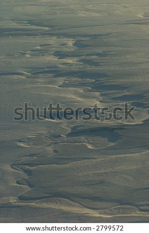 meandering river in the polar tundra, aerial shot