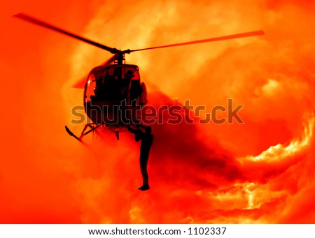 Stunt Man Hanging on Helicopter