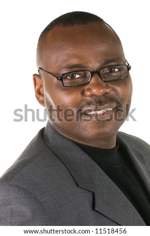 Black male model with glasses in sport coat on white background