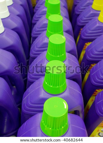 Row of cleaning liquid detergents.