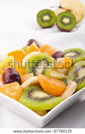 Fresh summer fruit salad. Kiwi,tangerine,grapes,apples,bananas.