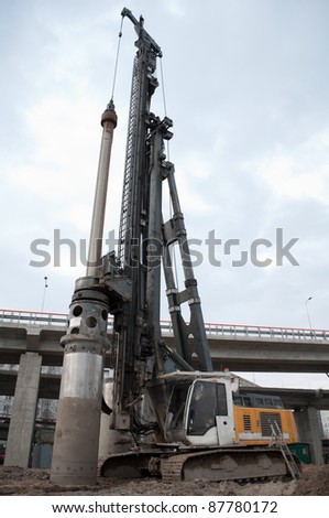 Drilling crane. Drill machine. Construction of the bridge.