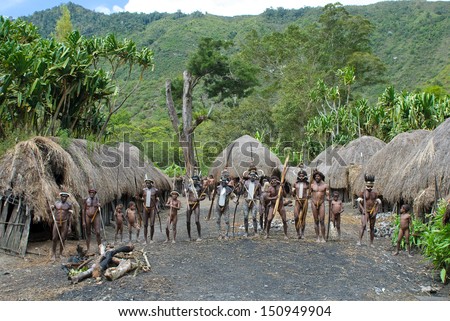WAMENA, PAPUA, INDONESIA - November, 14: Papuan people in the traditional village on November, 14, 2008 near Wamena, Papua, Indonesia.