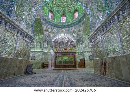 SHIRAZ, IRAN - May, 08, 2007: Mirrored interior of Ali Ibn Hamza shrine in Shiraz. Traditional decorative work in a mosaic of mirror glass.