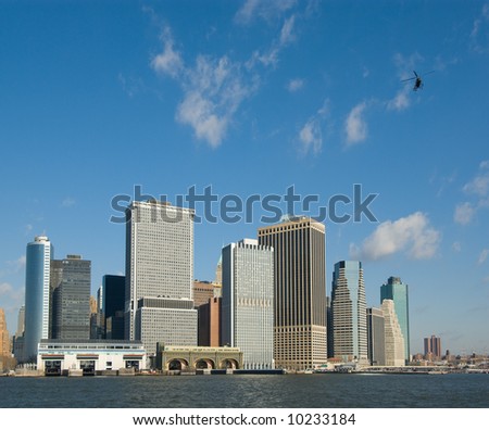 panorama of manhattan with flying helicopter, new york, usa
