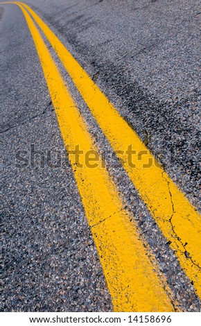 yellow dividing lines on the highway