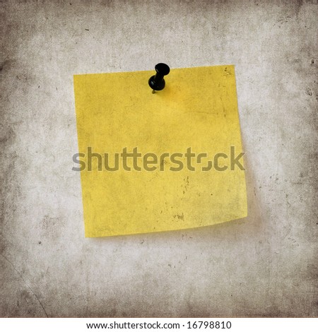 yellow note over grunge background