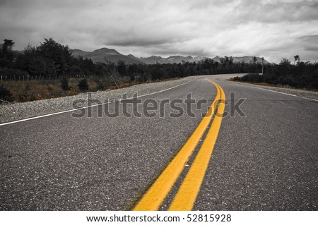 yellow dividing line of highway