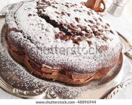 Chocolate Cake on silver tray.