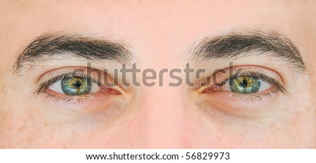 Closeup shot of the man's eyes.