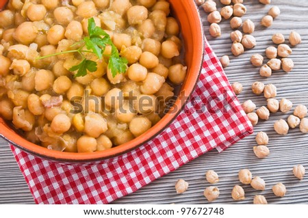 Chickpea soup in terracotta bowl.
