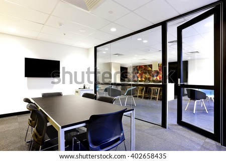 Panoramic Office Meeting room with huge glass walls and opened the door