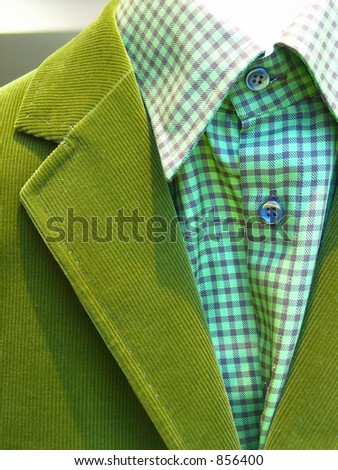 A green suit with a checked shirt