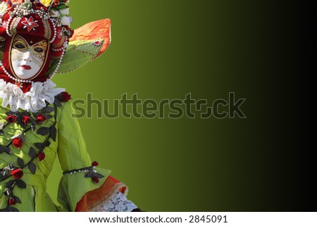 Model dressed in a costume with a decorated venetian mask. Copy space.