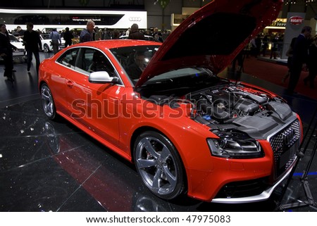 GENEVA - MARCH 3: Red Audi 4 door saloon at the 80th International Motor Show on March 3, 2010 in Geneva, Switzerland