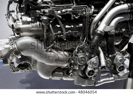 Metallic shiny new internal combustion engine showing details