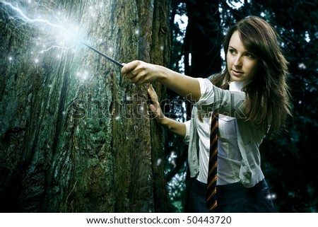 Teenage Wizard Girl With Magic Wand Casting