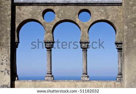 Open arch windows with a panoramic view of the blue open sky - Portugal, Sintra