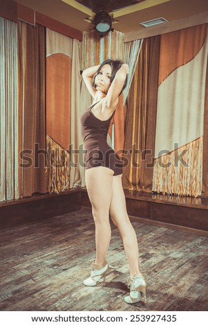 Woman warming up before dance classes
