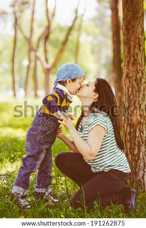 Son is kissing his mother
