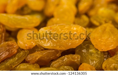 Close-up of yellow raisins. Top view point.
