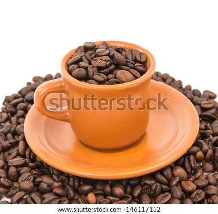 coffee beans with a cup of coffee isolated on white background