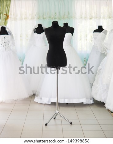 empty black mannequin in a wedding salon