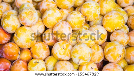 bunch of ripped yellow plums