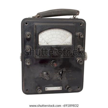 old instrument for measuring the electric current on a white background