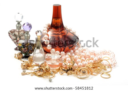 Luxury Perfume on Luxury Perfumes And Gold Jewelry With Pearl Necklace Stock Photo
