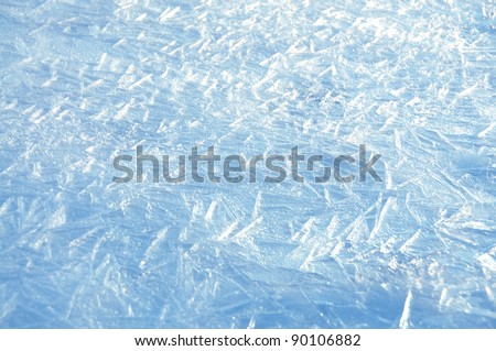 Ice texture, frozen river water in evening time