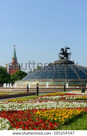 Manege Square and Monument on a glass cupola to Saint George and the Dragon, patron of Moscow