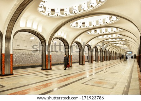 MOSCOW,RUSSIA-JANUARY 16:People walking at metro station on January 16,2014 in Moscow,Russia.It\'s rapid transit system serving Moscow.As of 2013,metro has 190 stations and its route length is 317.5 km