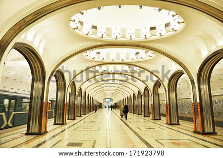 MOSCOW,RUSSIA-JANUARY 16:People walking at metro station on January 16,2014 in Moscow,Russia.It's rapid transit system serving Moscow.As of 2013,metro has 190 stations and its route length is 317.5 km