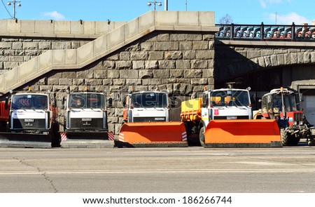 MOSCOW, RUSSIA - APRIL 5, 2014:Equipment of housing and communal services. Machines are designed for all-season maintenance of city roads and highways with asphalt and concrete cover.