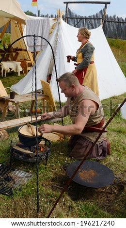 SALTVIK, ALAND ISLANDS, FINLAND - JULY 25, 2013:Viking market in Saltvik is one of Europe\'s largest Viking Markets. For three whole days, village is invaded by Vikings from all over Europe