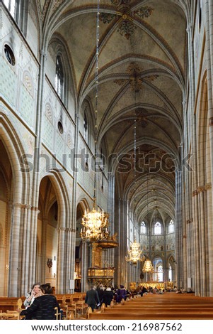 UPPSALA,SWEDEN - AUG 23,2014:Cathedral dates back to late 13th c and at height of 118.7 m.High altar is used for cathedral's services on most important feast days.Here all Swedish bishops are ordained