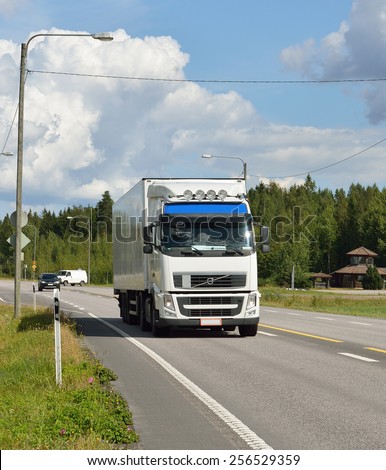 FINLAND - AUGUST 15,2014: Extensive road system is utilized by most internal cargo and passenger traffic. Country's network of main roads has total length of around 78,162 km