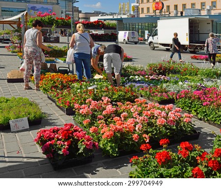 KUOPIO, FINLAND - JUNE 29, 2015:Kuopio market place, situated directly in center of city, is one of finest attractions. It is a traditional venue for encounters, sales and happenings