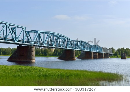 HAPARANDA, SWEDEN - JULY 11, 2015:Torne River Railway Bridge is dual gauge railway bridge between Haparanda, Sweden and Tornio, Finland; 1524mm rails used for Finland, 1435mm rails used for Sweden