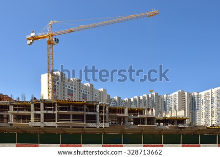 MOSCOW, RUSSIA - AUGUST 28, 2015: Facade of new modern high-rise apartment buildings in Moscow on background of blue sky. Residential complex \